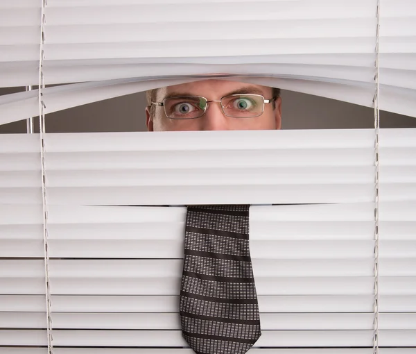 Man and window blinds — Stock Photo #35875507
