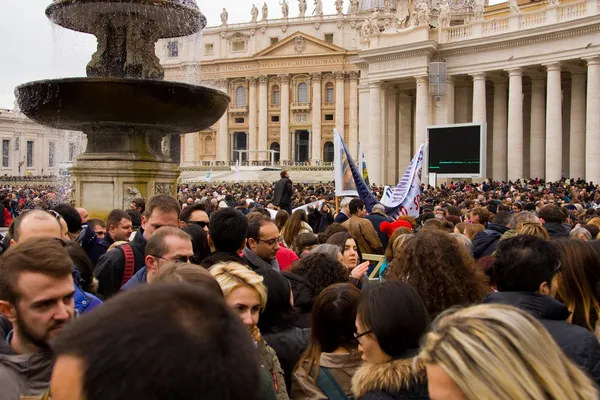 Waiting for the pope to recite the weekly Angelus prayer