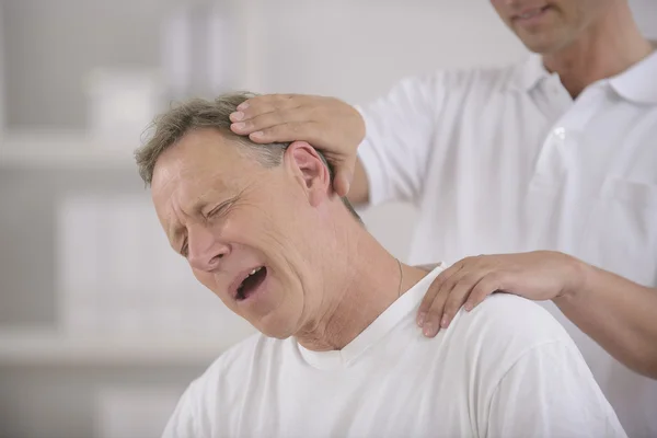 Chiropractic: Chiropractor doing neck adjustment