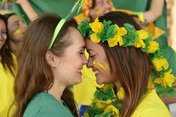 Girlfriends soccer fans  kissing