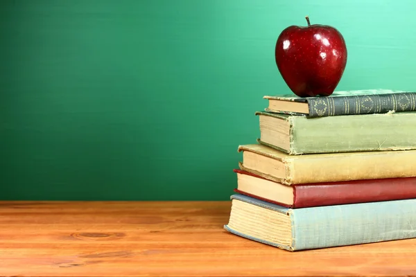 Back to School Books and Apple With Chalkboard