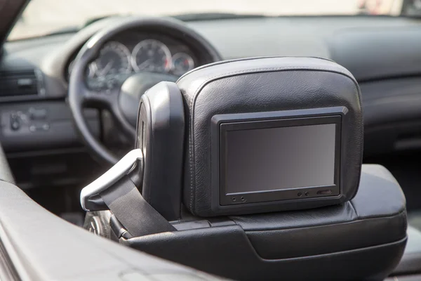 Multimedia screen in a luxury car