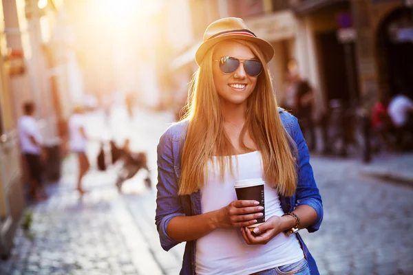 Young stylish woman in a city street