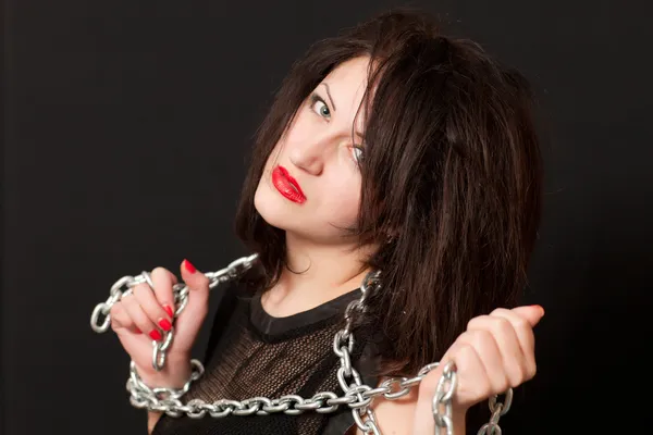 Woman and a steel chain