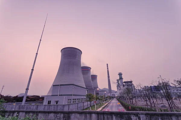 Coal fired power station with cooling towers