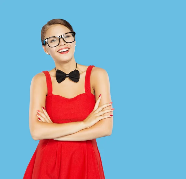 Woman happy in funny vintage glasses and bow tie. Blue Background