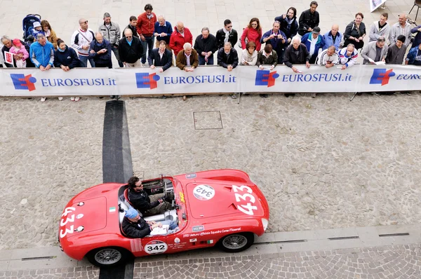 A red Maserati 150S takes part to the 1000 Miglia classic car race on May 16, 2014 in Este. The car was built in 1955