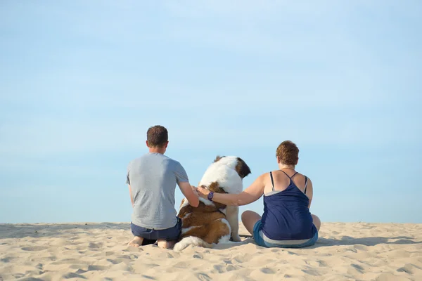 Owners with their dog