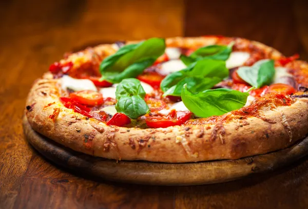 Pizza with salami and mozzarella
