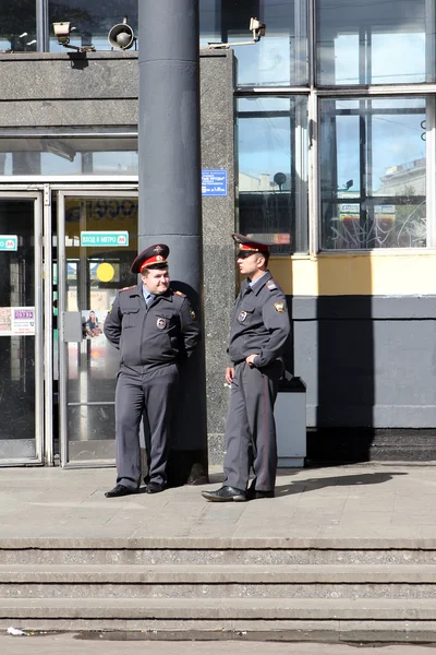 Moscow. The policemen near underground entrance