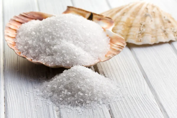 White crystal salt in seashell