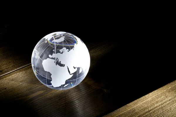 Glass globe on table