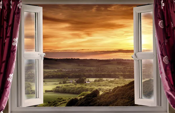 Open window to rural landscape