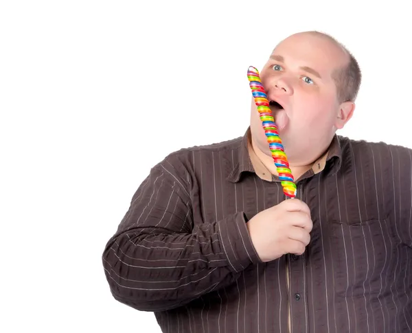 dep_13843619-Fat-man-enjoying-a-lollipop.jpg
