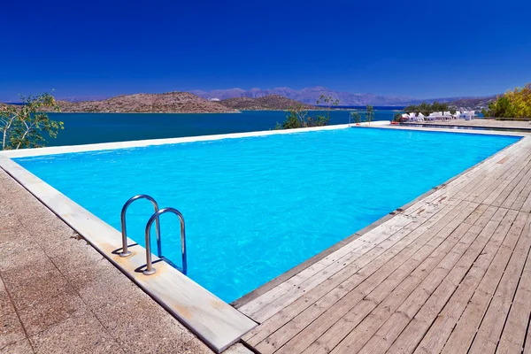 Blue swimming pool at Mirabello Bay