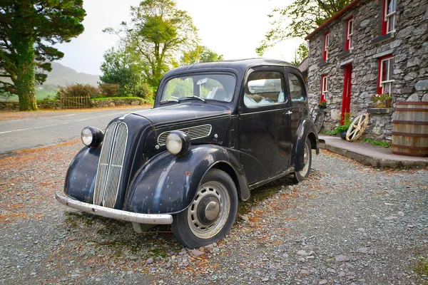 Vintage car at Irish cottage house