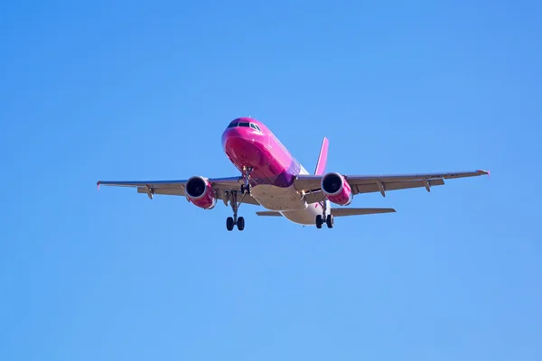 Wizz air plane landing on the airport in Gdansk