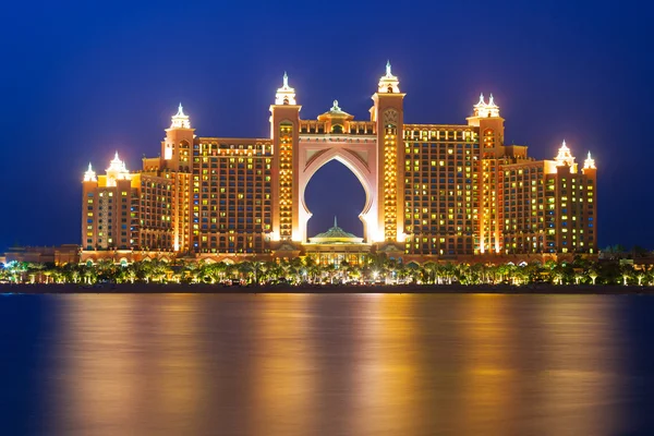 Atlantis hotel iluminated at night in Dubai
