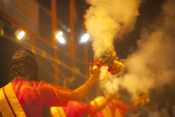 Hindu priests performs religious Ganga Aarti ritual (fire puja)