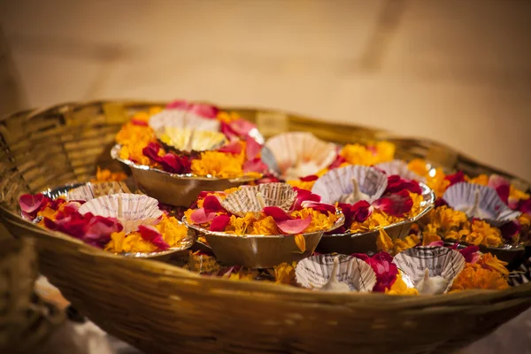 Flowers from religious Ganga Aarti ritual