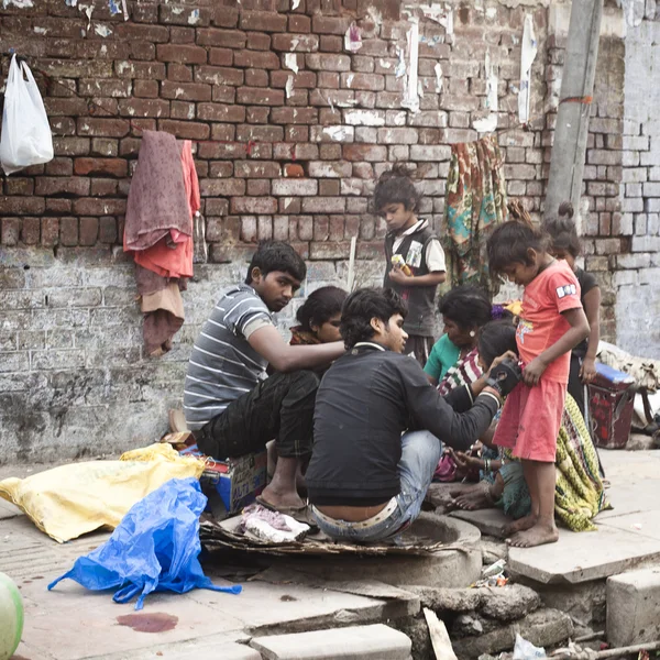 Poor indian family at the street