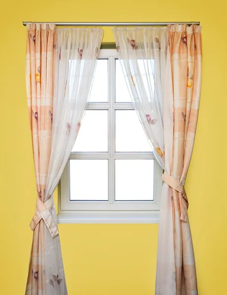 Window with white copyspace in a yellow room