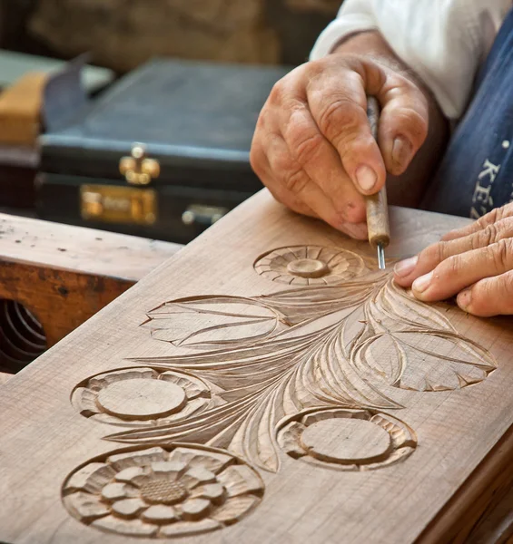 Carving flowers on wood