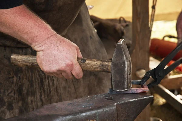 Blacksmith forged iron smith anvil hammerman