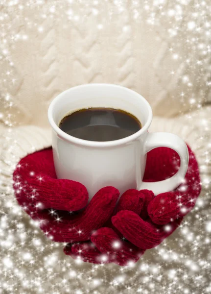 Woman in Sweater with Red Mittens Holding Cup of Coffee