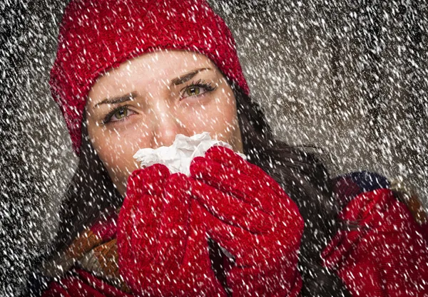 Sick Woman Blowing Her Sore Nose With Tissue and Snow