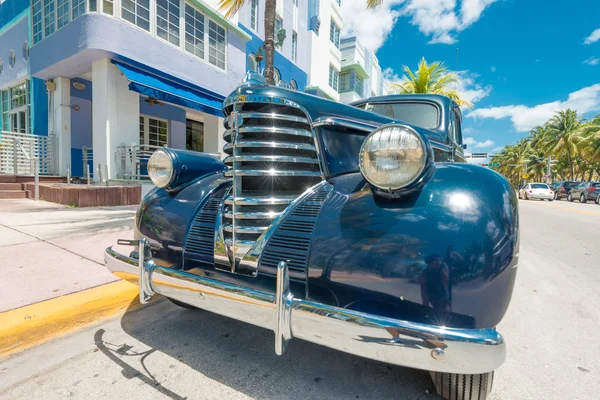 Vintage car parked at Ocean Drive in South Beach, Miami