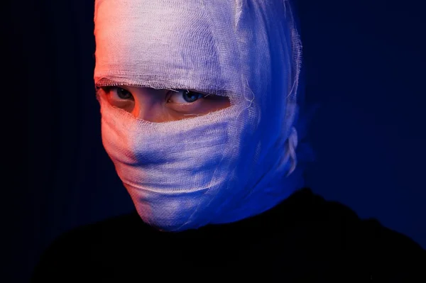 Infected sick girl with a bandage on her head