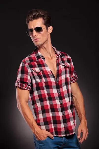 Handsome young male model with sunglasses