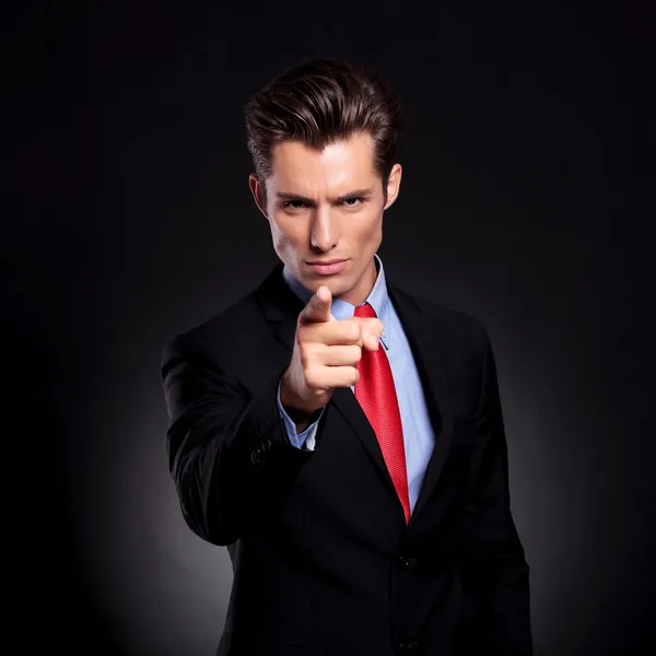 Business man pointing at you