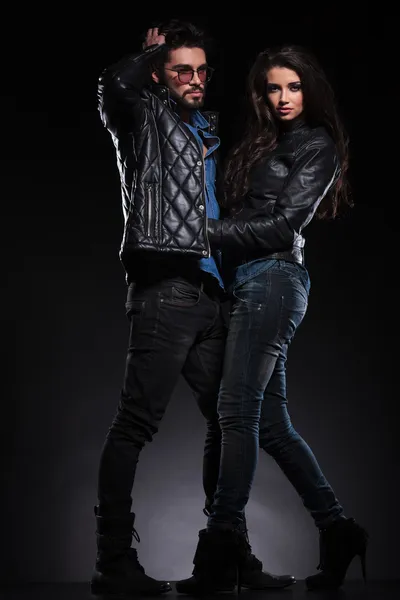 Fashion couple in leather jackets