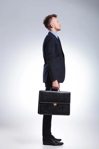Side of business man with briefcase