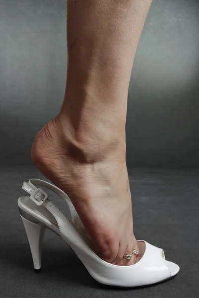 Woman feet wearing high heels