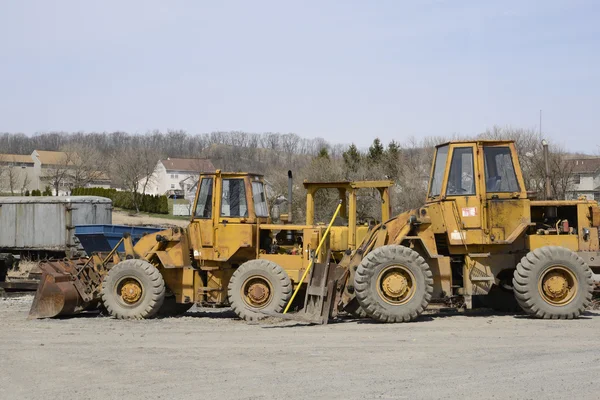 Several construction vehicles