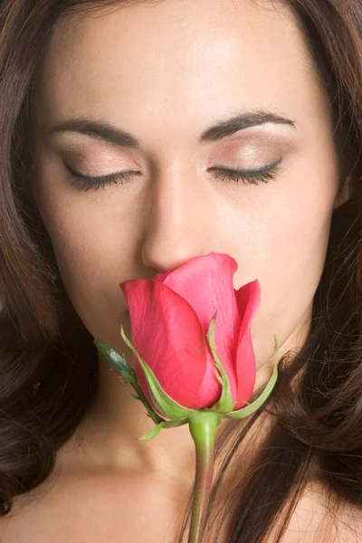 Tender woman smelling rose — Stock Photo #21821649