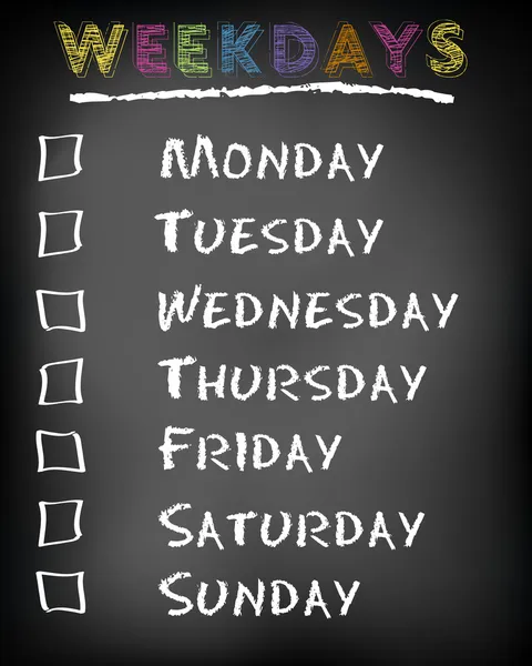 Conceptual weekdays list written on black chalkboard blackboard. Monday Tuesday Wednesday Thursday Friday Saturday Sunday.