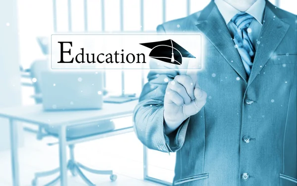 Business man pointing education concept