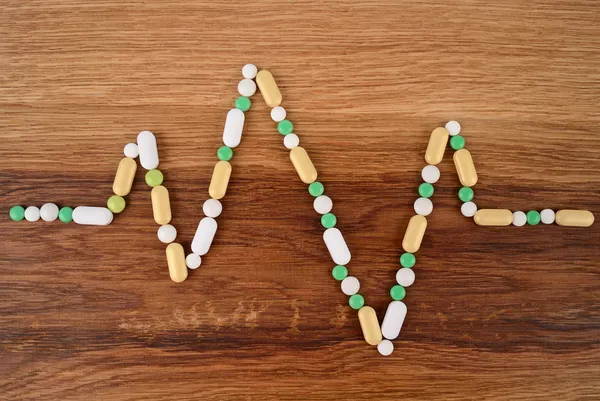 Heart rate graph line made from pills