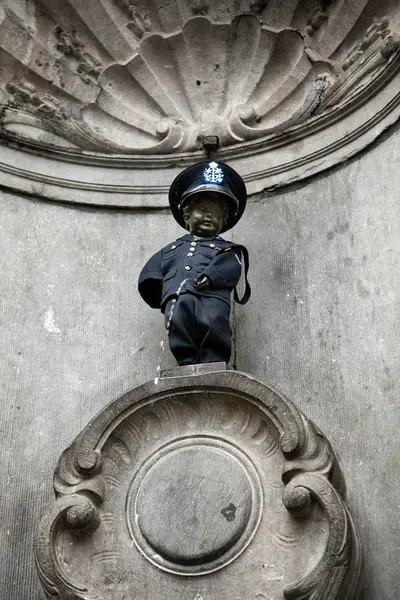 Manneken-Pis dressed in the costume of the Royal Federation of Retired Police Staff