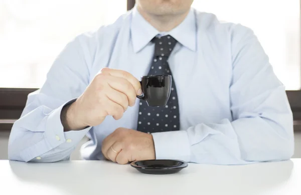 Man in the office coffee break