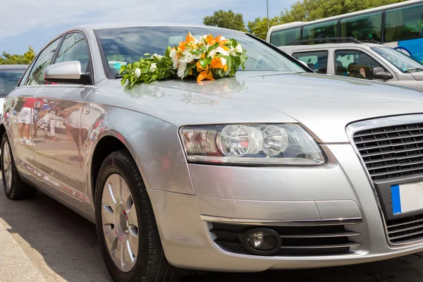 Wedding car Car decoration for wedding with big bouquet