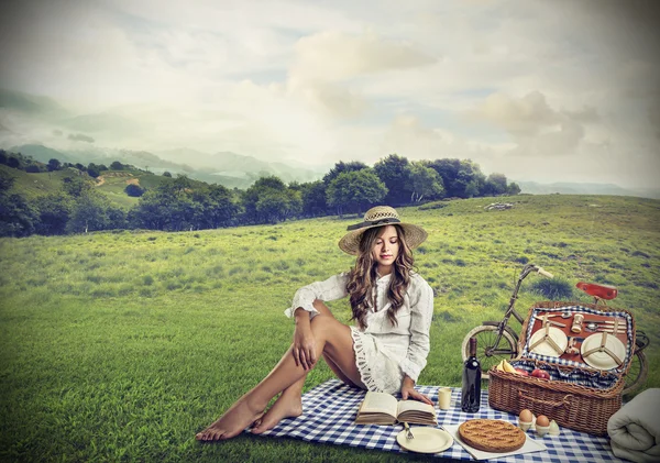 Young woman having a pic nic