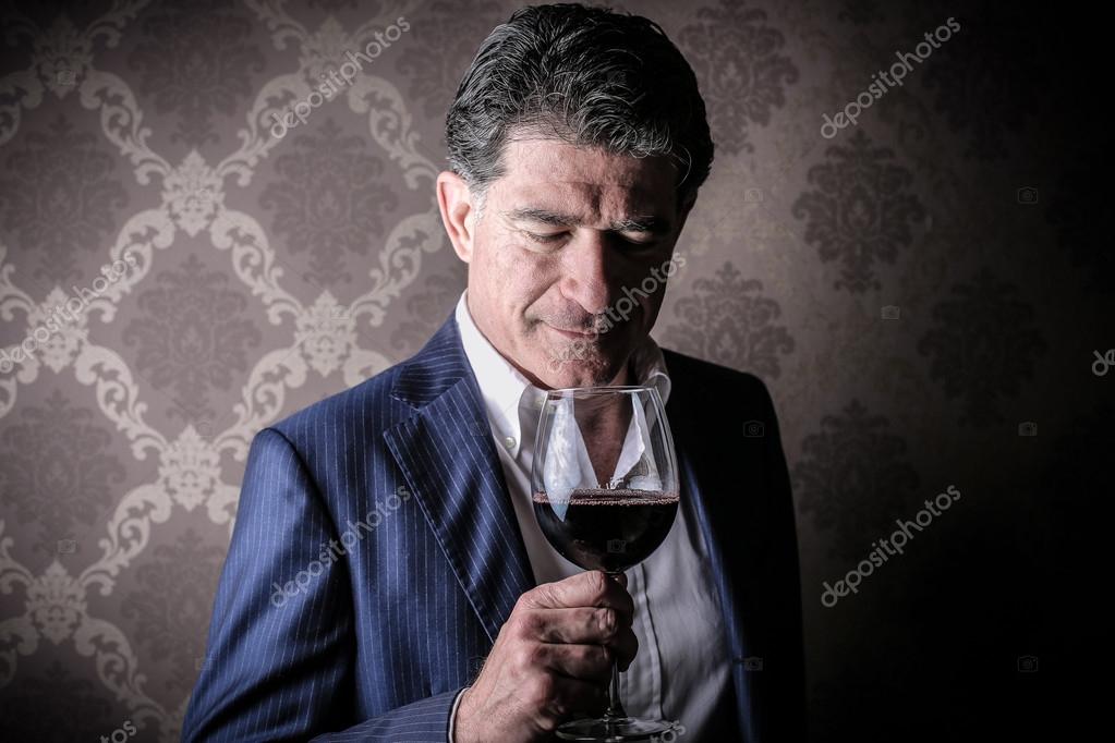 depositphotos_43988867-Elegant-rich-man-with-a-glass-of-wine.jpg