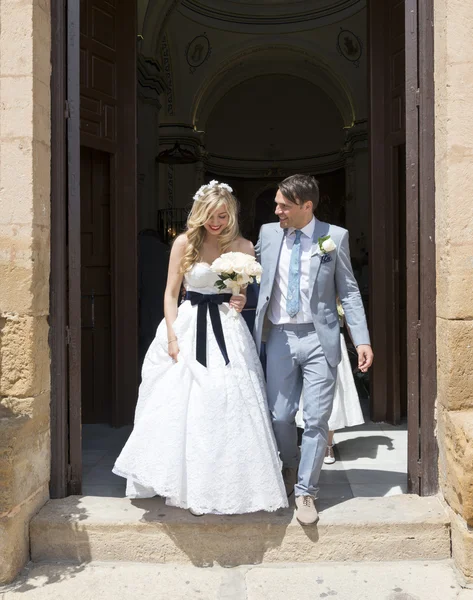 Bride and Groom leaving the church