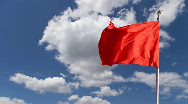 Red flags on the Tiananmen Square -- is a large city square in the center of Beijing, China