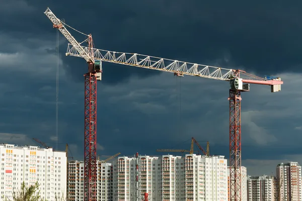 The building construction site. Lifting cranes